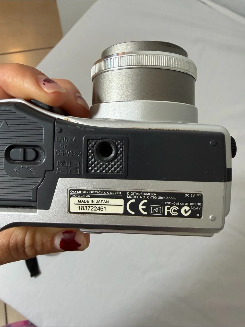 Olympus Silver Compact Digital Camera with Black Wrist Strap
